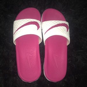 pink and white nike slides